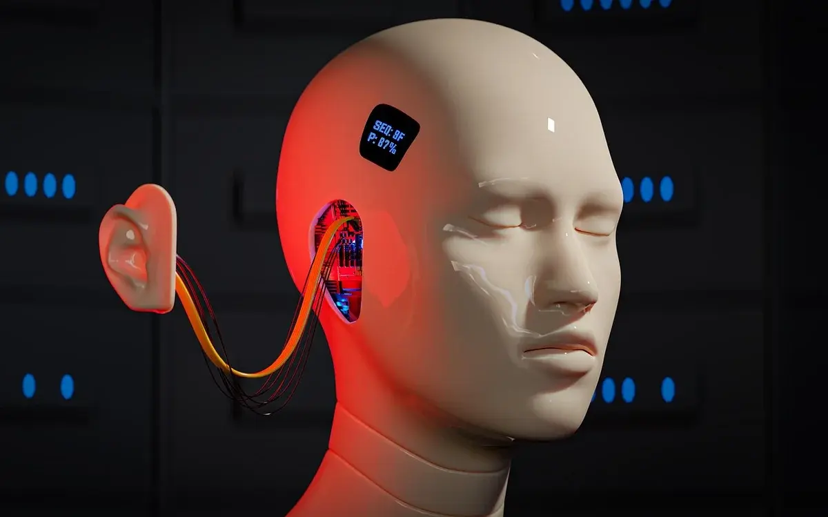 A humanoid robot head with exposed wiring and a small error display.