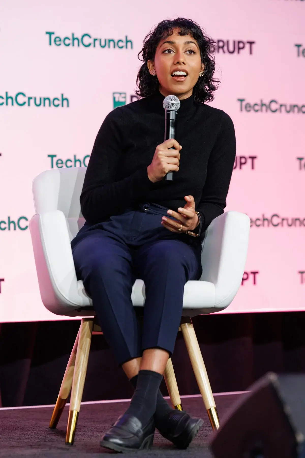 Irene Solaiman speaking on stage at TechCrunch Disrupt 2024.