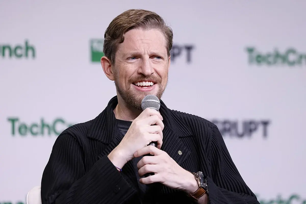 Matt Mullenweg speaking on stage at TechCrunch Disrupt 2024.